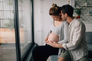 Photo of a young couple expecting a baby