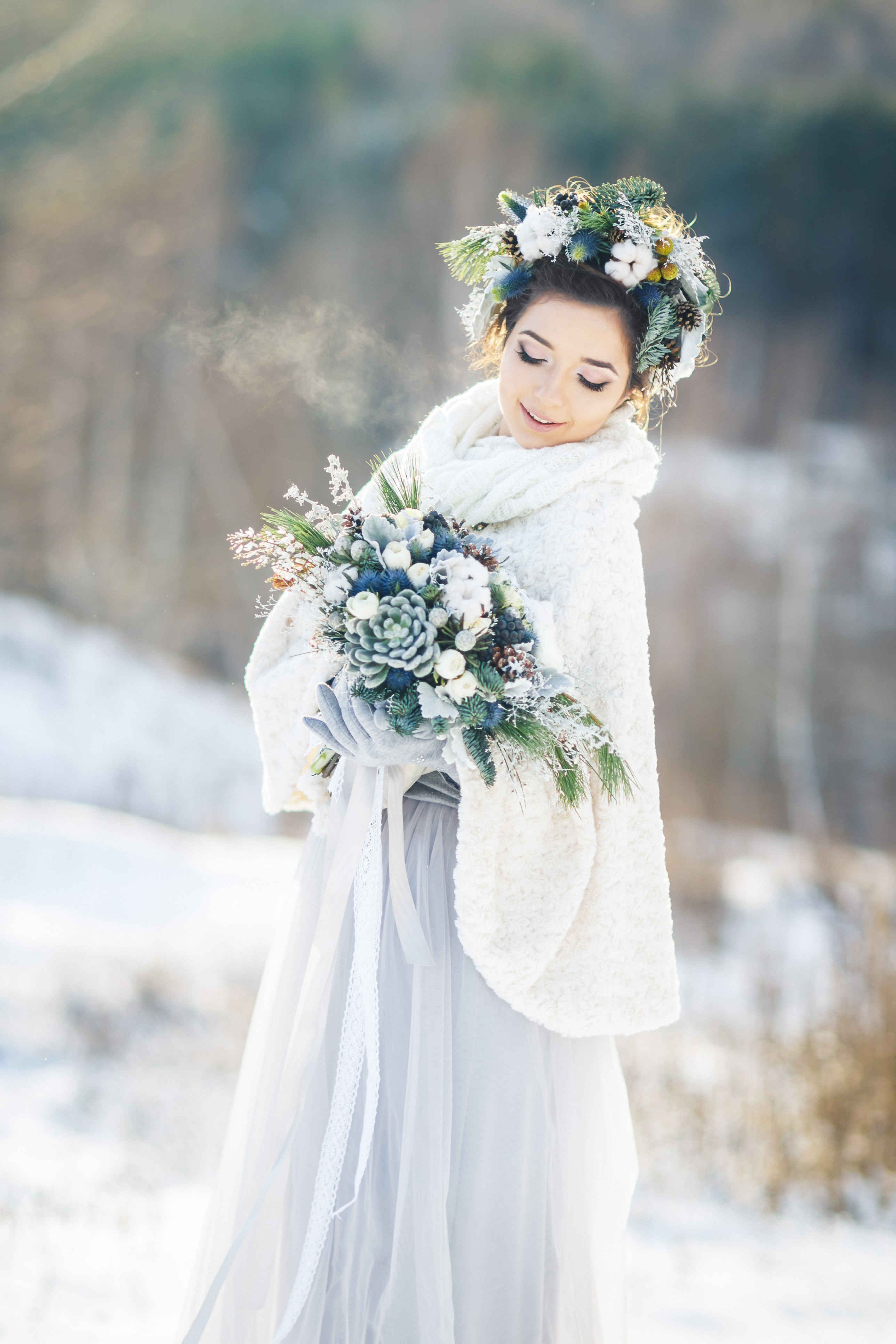 tenue de mariée et bouquet pour mariage hivernal